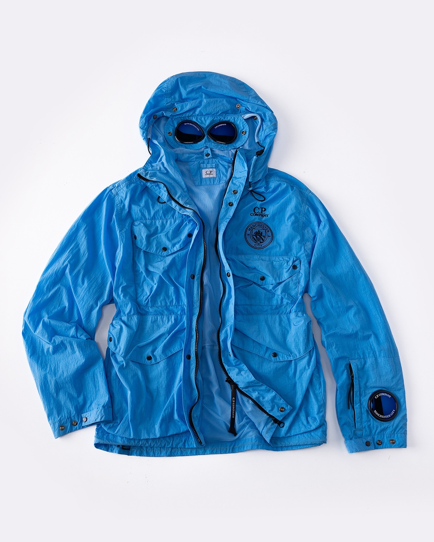 Куртка Goggle Jacket C.P. Company та клубу «Манчестер Сіті»